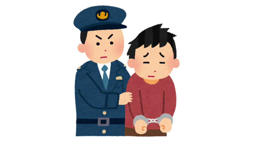 逮捕される男